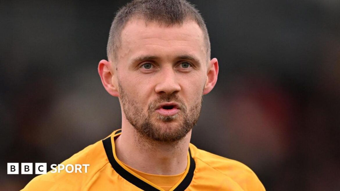 Shane McLoughlin in action for Newport County