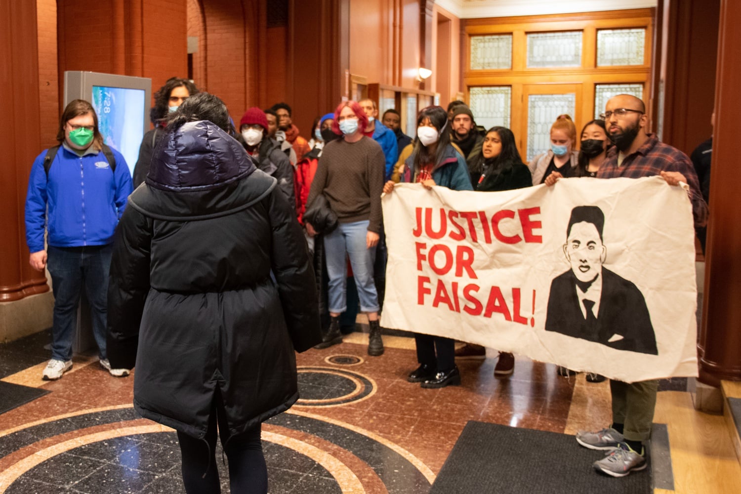 Protesters entered Cambridge City Hall on Jan . 23 confronting Mayor Siddiqui demanding names be released .