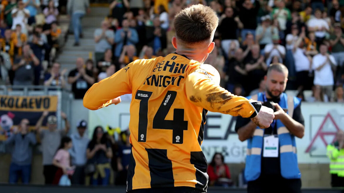 Cambridge close in on automatic promotion after beating Barrow