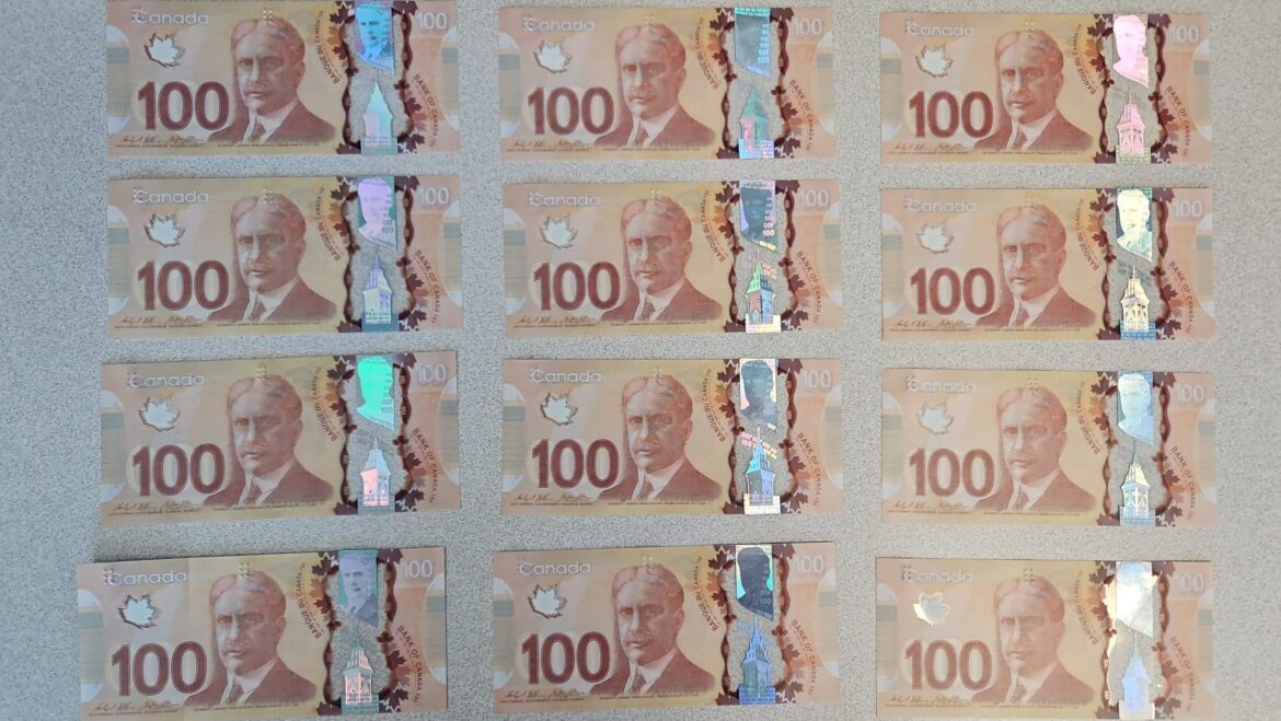 Fake money being handed out in buy-and-sell incidents