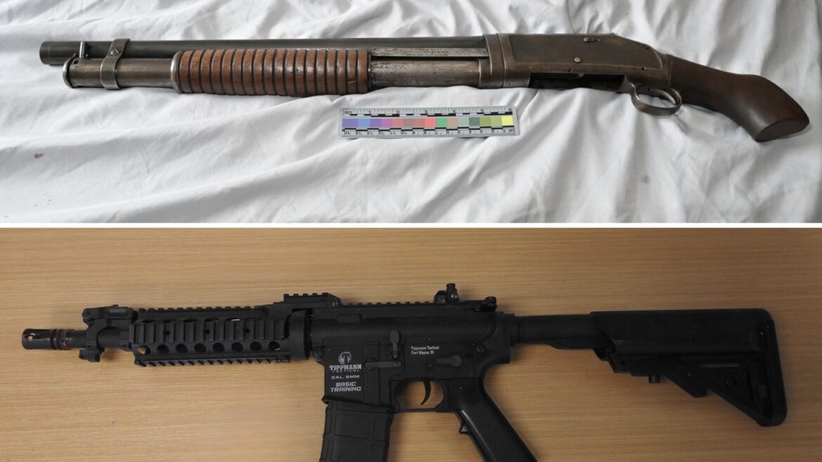 Brass knuckles, guns taken from Cambridge home